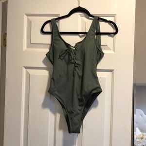 Green one piece bathing suit